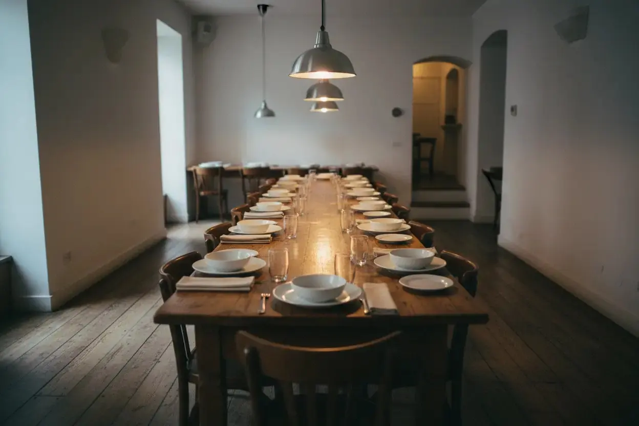 A long table laid for dinner in the bistro's dining room